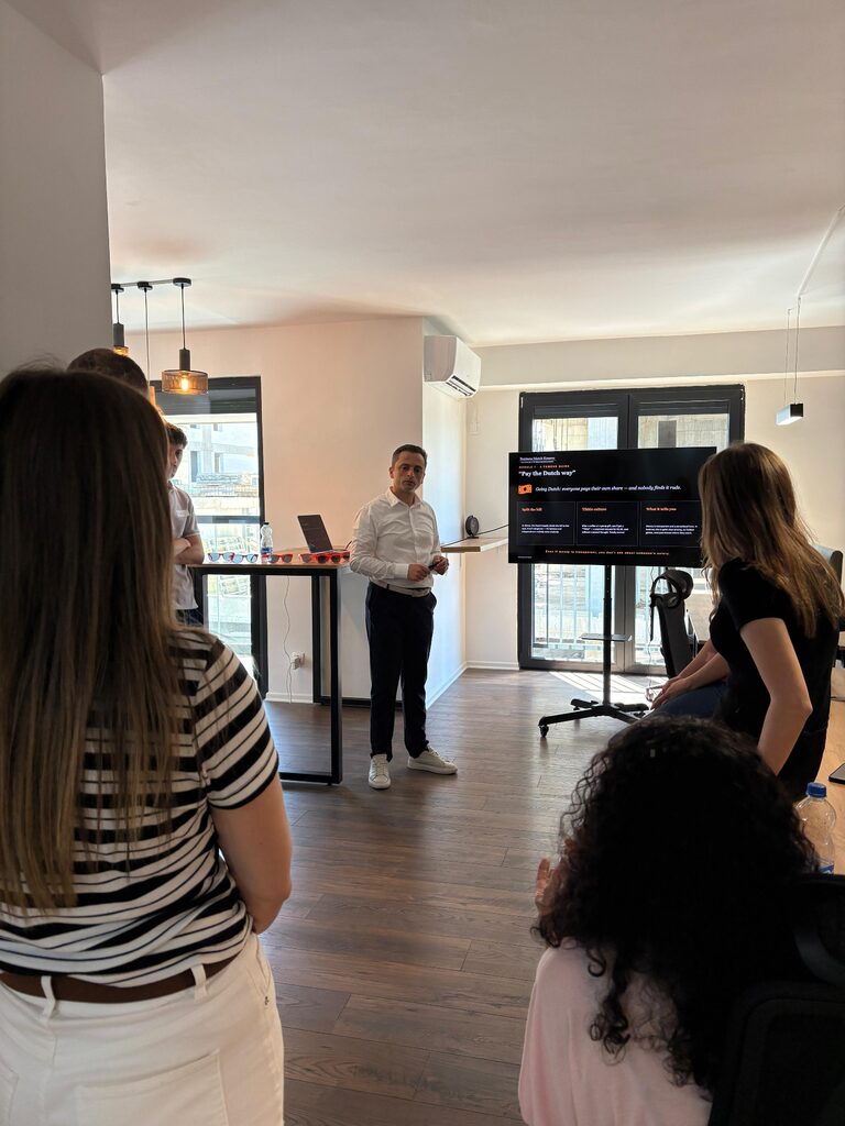 Participants in conversation with the tre plus team during the training
